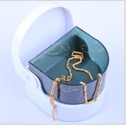 Portable jewelry washing machine